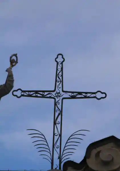 Church of St. Ambrose, cross with swirls on a steeple